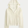 Beachy-tyylinen virkattu huppari, V-kaulus