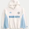 Boxy Manchester City F.C. -grafiikkahuppari Boxy Manchester City F.C. -grafiikkahuppari