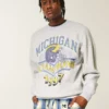 Boxy University of Michigan Wolverines -graafinen collegepaita Boxy University of Michigan Wolverines -graafinen collegepaita