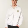 Boxy Zip-Up Club América Las Águilas -grafiikkahuppari Boxy Zip-Up Club América Las Águilas -grafiikkahuppari