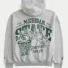 Boxy Zip-Up Michigan State University Spartans -grafiikkahuppari Boxy Zip-Up Michigan State University Spartans -grafiikkahuppari