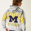 Boxy Zip-Up University of Michigan Wolverines -grafiikkahuppari Boxy Zip-Up University of Michigan Wolverines -grafiikkahuppari
