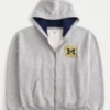 Boxy Zip-Up University of Michigan Wolverines -grafiikkahuppari Boxy Zip-Up University of Michigan Wolverines -grafiikkahuppari