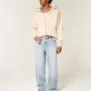 Brodeeratut vaaleat skater-baggy-farkut Brodeeratut vaaleat skater-baggy-farkut