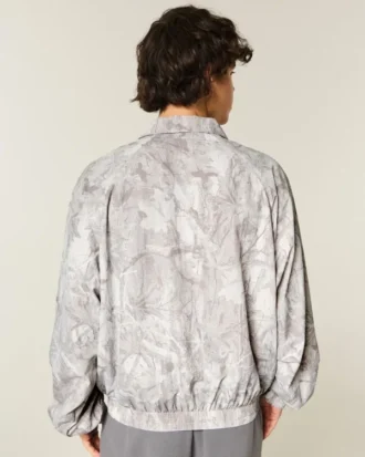 Camouflage-vetoketjullinen tuulitakki