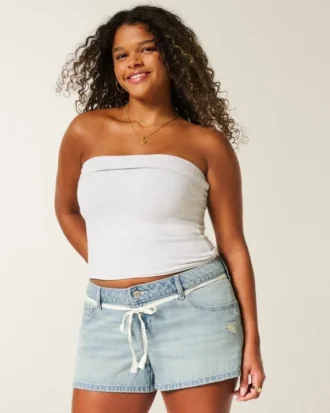 Erittäin matala vyötärö, vaalea pesu, pitsi-nauhat, denim-minishortsit