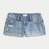 Erittäin matalat brodeeratut denim-minishortsit Erittäin matalat brodeeratut denim-minishortsit