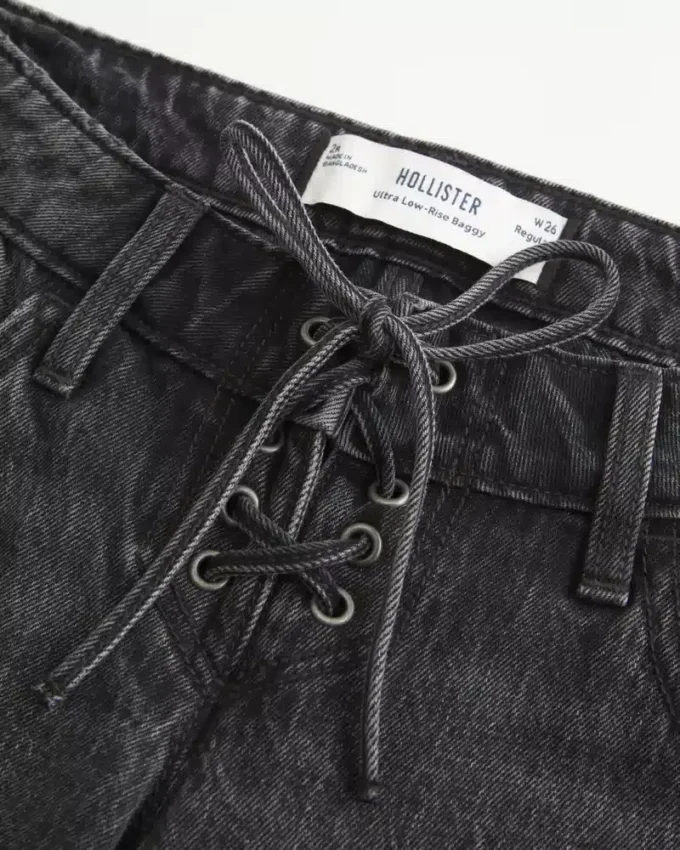 Erittäin matalat, pestyt mustat nauhalliset baggy-farkut Erittäin matalat, pestyt mustat nauhalliset baggy-farkut