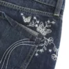Erittäin matalat, tummat, perhoskoristeiset denim-minishortsit Erittäin matalat, tummat, perhoskoristeiset denim-minishortsit