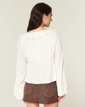 Helppo pitkähihainen röyhelöinen babydoll-toppi