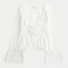 Helppo pitkähihainen röyhelöinen babydoll-toppi Helppo pitkähihainen röyhelöinen babydoll-toppi