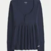 Helppo sitoa takaa Henley-babydoll-toppi Helppo sitoa takaa Henley-babydoll-toppi