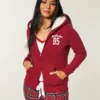 Holiday Vault Release Sherpa-vuorattu vetoketjullinen logopaita Holiday Vault Release Sherpa-vuorattu vetoketjullinen logopaita