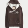 Holiday Vault Release Sherpa-vuorattu vetoketjullinen logopaita Holiday Vault Release Sherpa-vuorattu vetoketjullinen logopaita