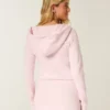 Huppuinen pitkähihainen fleece-mekko Huppuinen pitkähihainen fleece-mekko