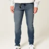 Keskipesty urheilullinen skinny-farkku Keskipesty urheilullinen skinny-farkku