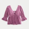 Kolmen neljäsosan hihainen babydoll-toppi Kolmen neljäsosan hihainen babydoll-toppi