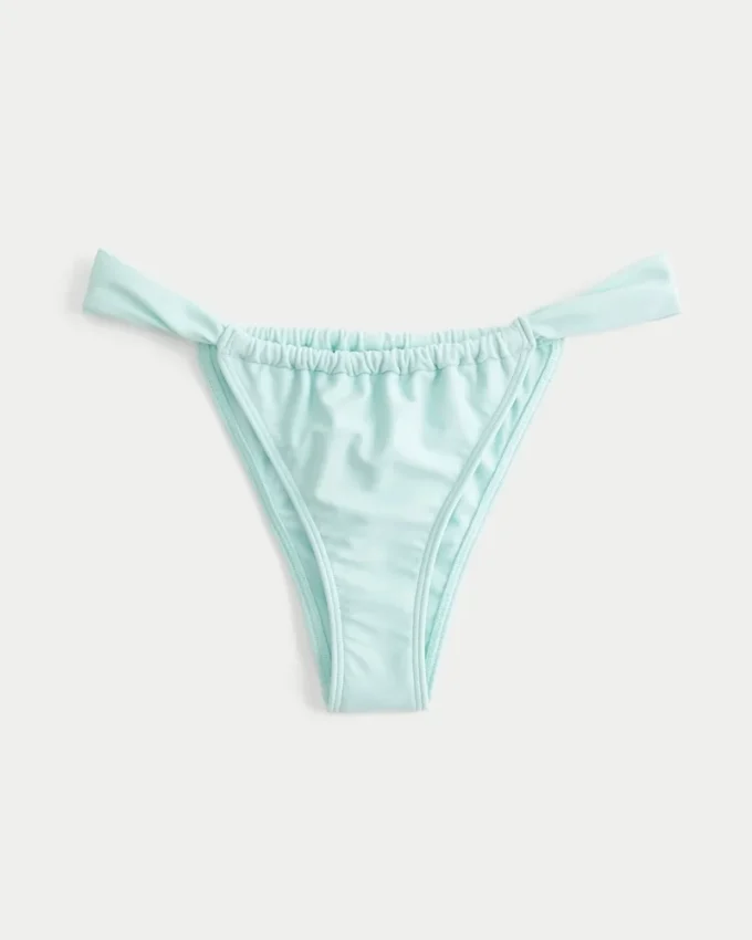 Leveä olkaimella varustettu, korkealla leikattu Cheekiest-bikinien alaosa