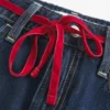 Matala vyötärö, solmittava denim-minihame Matala vyötärö, solmittava denim-minihame