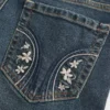 Matala vyötärö, tumma pesu, brodeeratut bootcut-farkut Matala vyötärö, tumma pesu, brodeeratut bootcut-farkut