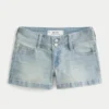 Matala vyötärö, vaalea pesu, kukkakuvioiset taskut, denim-shortit Matala vyötärö, vaalea pesu, kukkakuvioiset taskut, denim-shortit