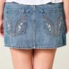 Matala vyötäröinen brodeerattu denim-minihame Matala vyötäröinen brodeerattu denim-minihame