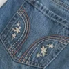 Matala vyötäröinen brodeerattu denim-minihame Matala vyötäröinen brodeerattu denim-minihame