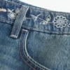 Matala vyötäröinen brodeerattu denim-minihame