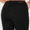 Matala vyötäröinen musta bootcut-farkku Matala vyötäröinen musta bootcut-farkku