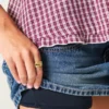 Matala vyötäröinen nastoitettu denim-minihame Matala vyötäröinen nastoitettu denim-minihame