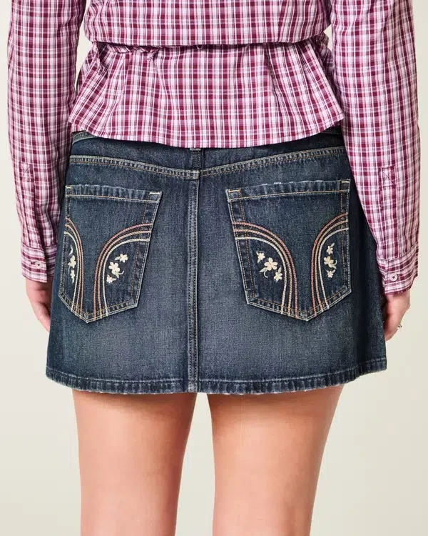 Matala vyötäröinen tumma denim-minihame Matala vyötäröinen tumma denim-minihame