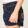 Matala vyötäröinen tumma pesu ruudullinen taskuinen denim-minihame Matala vyötäröinen tumma pesu ruudullinen taskuinen denim-minihame