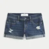 Matala vyötäröiset, repeytyneet tummat denim-shortit Matala vyötäröiset, repeytyneet tummat denim-shortit