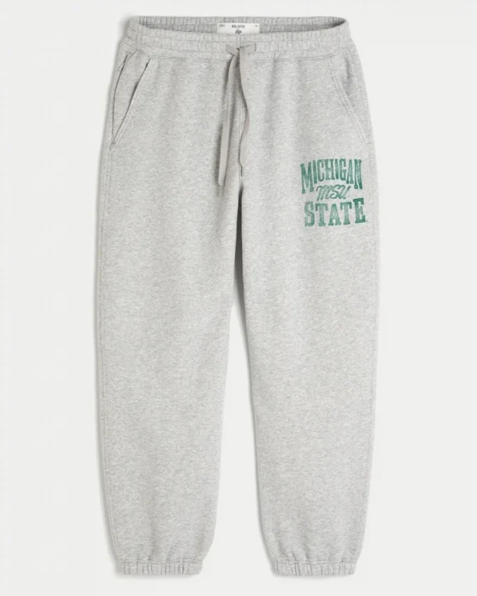 Michigan State University Spartans -grafiikka, väljät fleece-jogginghousut Michigan State University Spartans -grafiikka, väljät fleece-jogginghousut