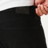 Mustat haalistumattomat urheilulliset skinny-farkut Mustat haalistumattomat urheilulliset skinny-farkut
