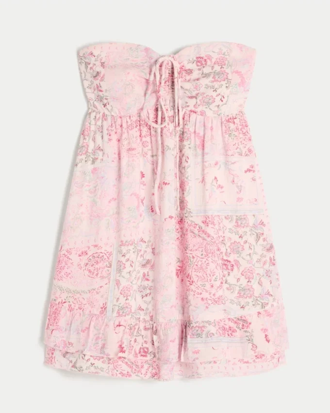 Olkaimeton röyhelöinen babydoll-minimekko Olkaimeton röyhelöinen babydoll-minimekko