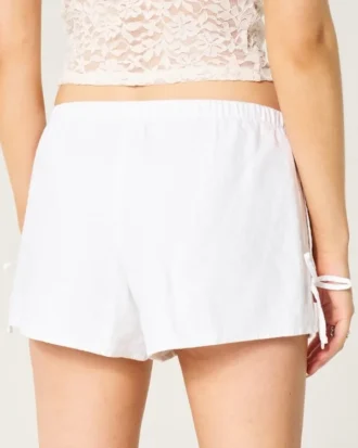 Pehmeät shortsit, joissa sivussa rusetti, pellavaseosta