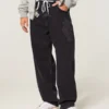 Pesty musta Dragon-grafiikka Skater Baggy Jeans Pesty musta Dragon-grafiikka Skater Baggy Jeans
