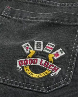 Pesty musta Good Luck -kirjailtu skater-malliset baggy-farkut