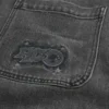 Pesty musta logo-grafiikka Baggy-farkut Pesty musta logo-grafiikka Baggy-farkut