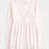 Pitkähihainen Flyaway Babydoll -neuletakki Pitkähihainen Flyaway Babydoll -neuletakki