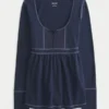 Pitkähihainen Henley-babydoll-toppi Pitkähihainen Henley-babydoll-toppi