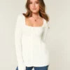 Pitkähihainen, neliönkauluksinen babydoll-neule Pitkähihainen, neliönkauluksinen babydoll-neule