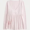 Pitkähihainen, rintamuksellinen graafinen babydoll-toppi Pitkähihainen, rintamuksellinen graafinen babydoll-toppi