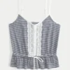 Pitsi-yksityiskohdat Peplum-toppi
