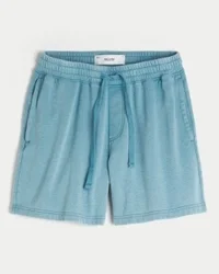 Polven yläpuolelle ulottuvat, väljät fleece-shortsit
