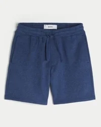 Polven yläpuolelle ulottuvat, väljät fleece-shortsit