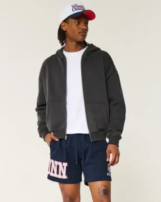 Polvipituiset fleece-shortsit, joissa UConn Huskies -grafiikka