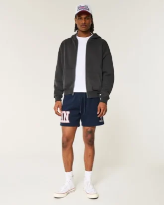 Polvipituiset fleece-shortsit, joissa UConn Huskies -grafiikka