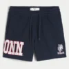 Polvipituiset fleece-shortsit, joissa UConn Huskies -grafiikka Polvipituiset fleece-shortsit, joissa UConn Huskies -grafiikka